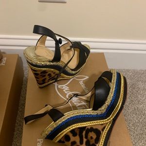 Like New barely worn them Louis Vuitton shoes